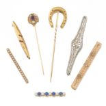 A Group of Vintage Gold Pins