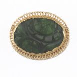 Carved Jadeite and Gold Brooch