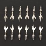 Twelve Webster Sterling Silver Corn Skewers