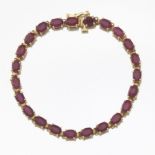 Ladies' Gold and Ruby Tennis Bracelet