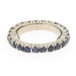 Ladies' Gold and Blue Sapphire Eternity Band