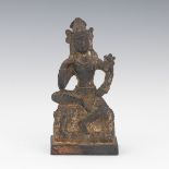 Tibetan Gilt Patinated Bronze Avalokitesvara on Lion Pedestal
