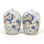 Chinese Pair of Enameled Porcelain Jar with Covers, "Seven Egrets", Apocryphal Qianlong Marks