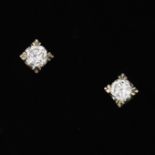 A Pair of Diamond Stud Earrings