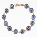 Ladies' Gold and Blue Topaz Color Glass "Protection Against Evil" Bracelet