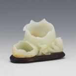 Carved Jade Figure of Lizard on a Blossom