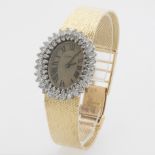Ladies' Gold and Diamond Dress Geneva Quartz Watch with Solid Gold Bracelet