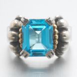 Ladies' Caviar Tudor Style Gold, Sterling Silver and Blue Topaz Ring