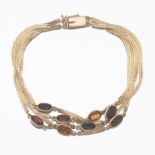 Ladies' Gold, Amethyst, Garnet and Citrine Four-Strand Bracelet