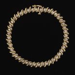Ladies' Gold and Diamond Scroll Design Tennis Bracelet