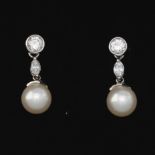 A Pair of Day To Night Diamond and Pearl Drop Earrings