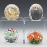 Four Glass Paperweights