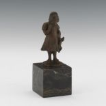 Bronze Figurine of a Girl Holding a Harlequin Doll