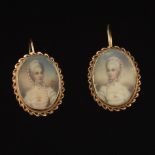 Pair of Portrait Gold Earrings