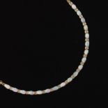 Ladies' Gold and Opal Tennis Bracelet