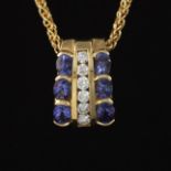 Ladies' Gold, Tanzanite and Diamond Slider on Parisian Wheat Chain