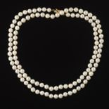 A Classic Matinee Pearl Necklace with Gold Clasp