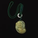 A Carved Jade Buddha on Cord