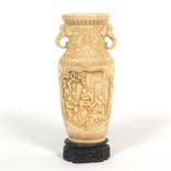 Carved Figural Urn Vase
