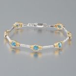 Ladies' Two-Tone Gold and Blue Topaz Bracelet
