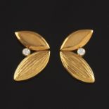 A Pair of Gold and Diamond Earrings