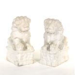 Pair of Chinese Carved Marble Foo Lions on Dragon Pedestals