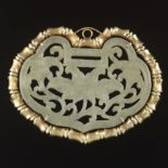 Carved Jade Medallion in Gold Frame, Signed "LarrY"
