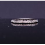 TIFFANY & CO, PLATINUM DIAMOND ETERNITY RING.