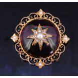 AN ANTIQUE GARNET, DIAMOND AND PEARL BROOCH