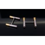 CARTIER, PAIR OF BI-COLOR GOLD CARTRIDGE CUFFLINKS