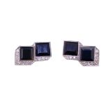 A PAIR OF ART DECO ONYX AND DIAMOND CUFFLINKS,