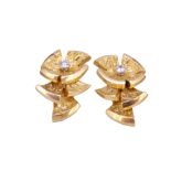 CARTIER, A PAIR OF DIAMOND SET EAR CLIPS