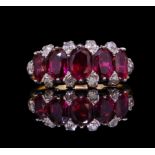 ANTIQUE FIVE STONE RUBY RING WITH DIAMOND POINTS