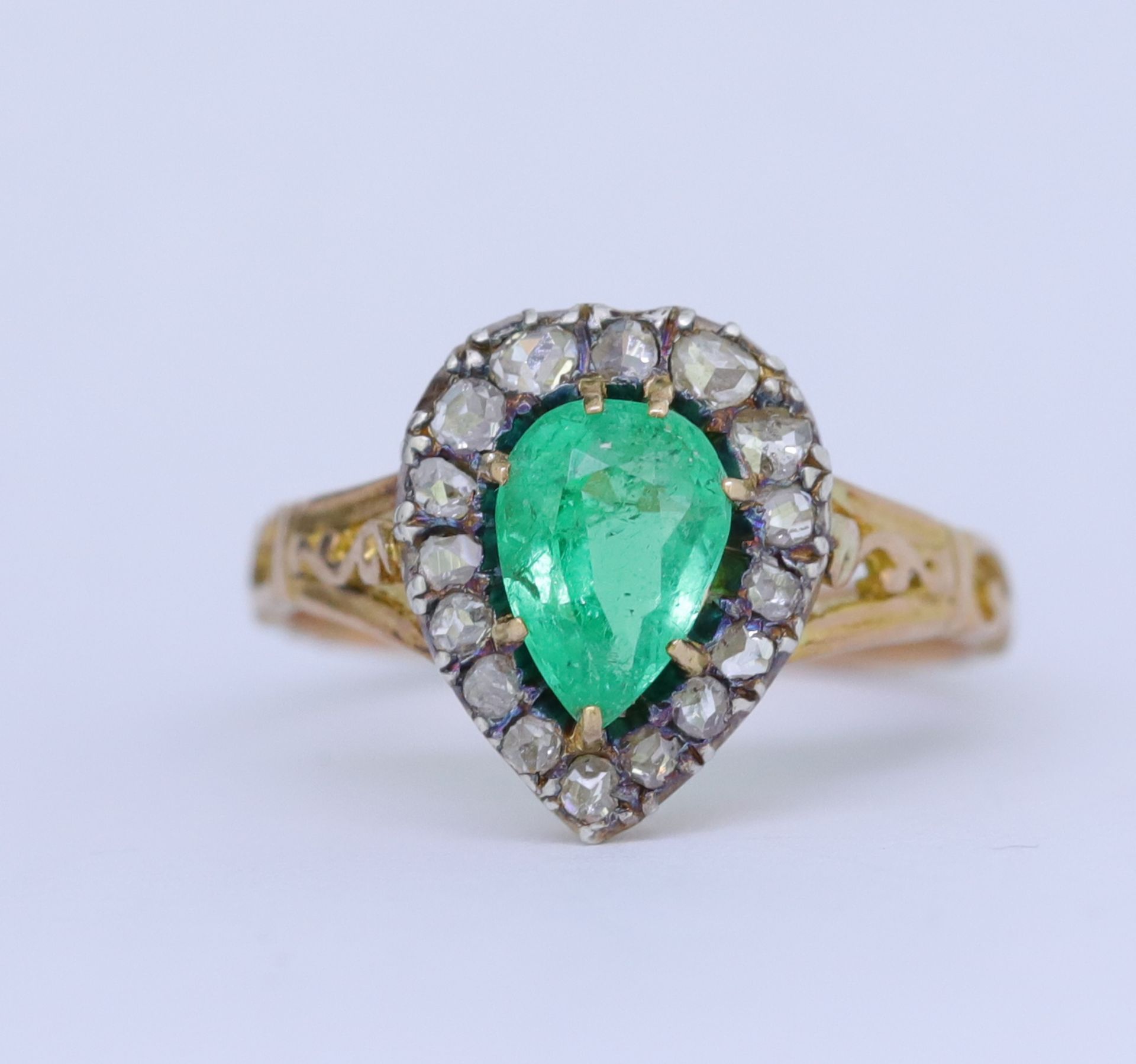 ANTIQUE EMERALD AND DIAMOND CLUSTER RING