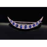 SAPPHIRE AND DIAMOND CRESCENT BROOCH