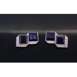 A PAIR OF ART DECO ONYX AND DIAMOND CUFFLINKS