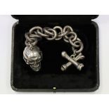 A 19TH CENTURY MEMENTO MORI MUSICAL REPEATER SKULL WATCH AND ALBERT CHAIN