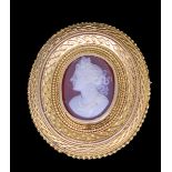 GAUNT, CARVED CAMEO IN GOLD SURMOUNT