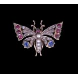 A DIAMOND AND GEMSET BUTTERFLY BROOCH