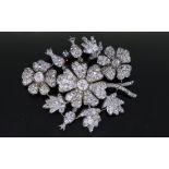 IMPORTANT DIAMOND EN TREMBLANT FLORAL BROOCH