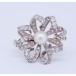 NATURAL PEARL AND DIAMOND SWIRL BROOCH