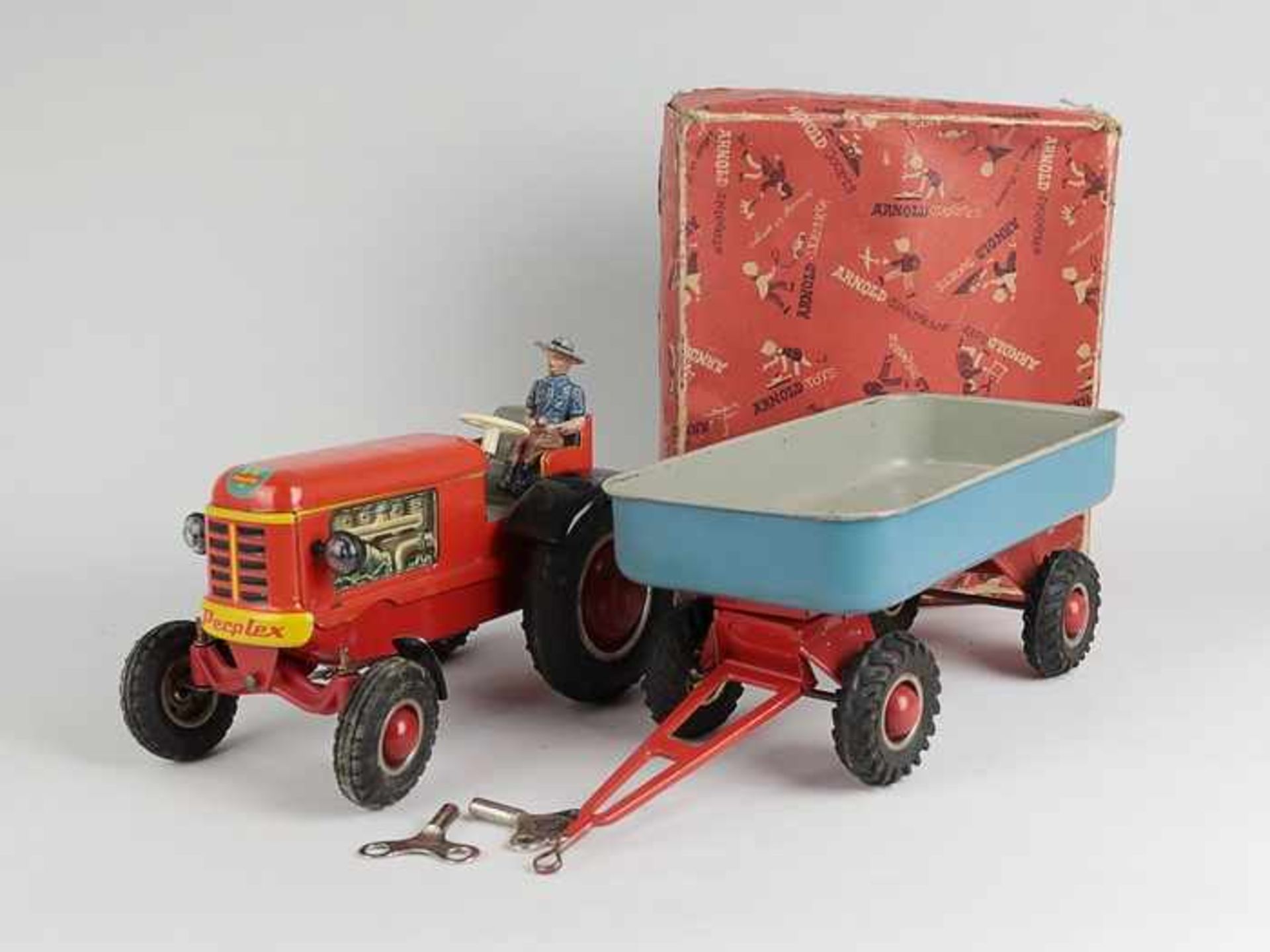 Arnold - Blechspielzeug1950/60er J., Traktor m. Anhänger, Perplex, Blech, rot/blau lakiert/litho.,