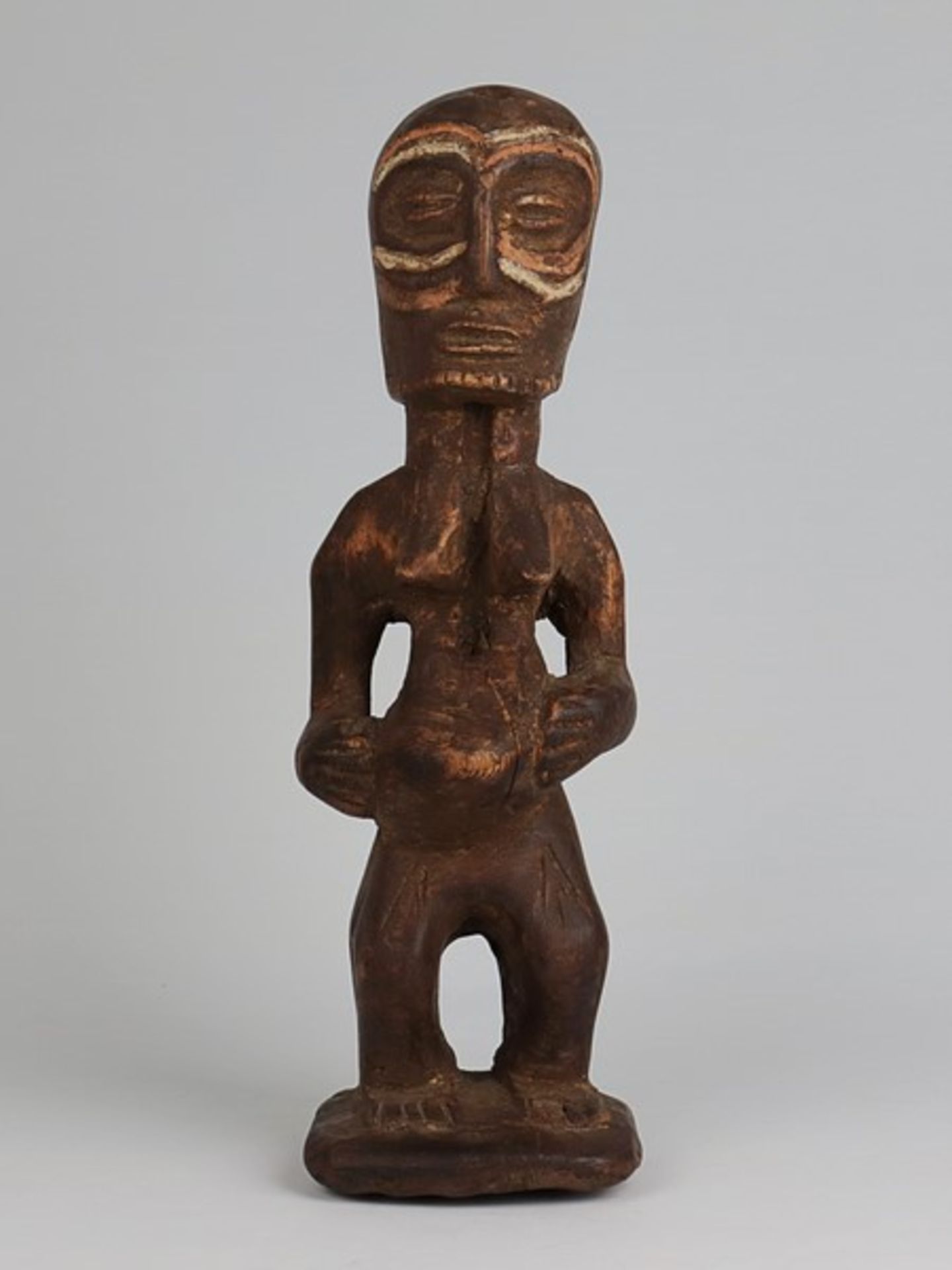 Holzfigur20.Jh., Afrika, vollplastische Holzschnitzerei, stehende männliche Figur,