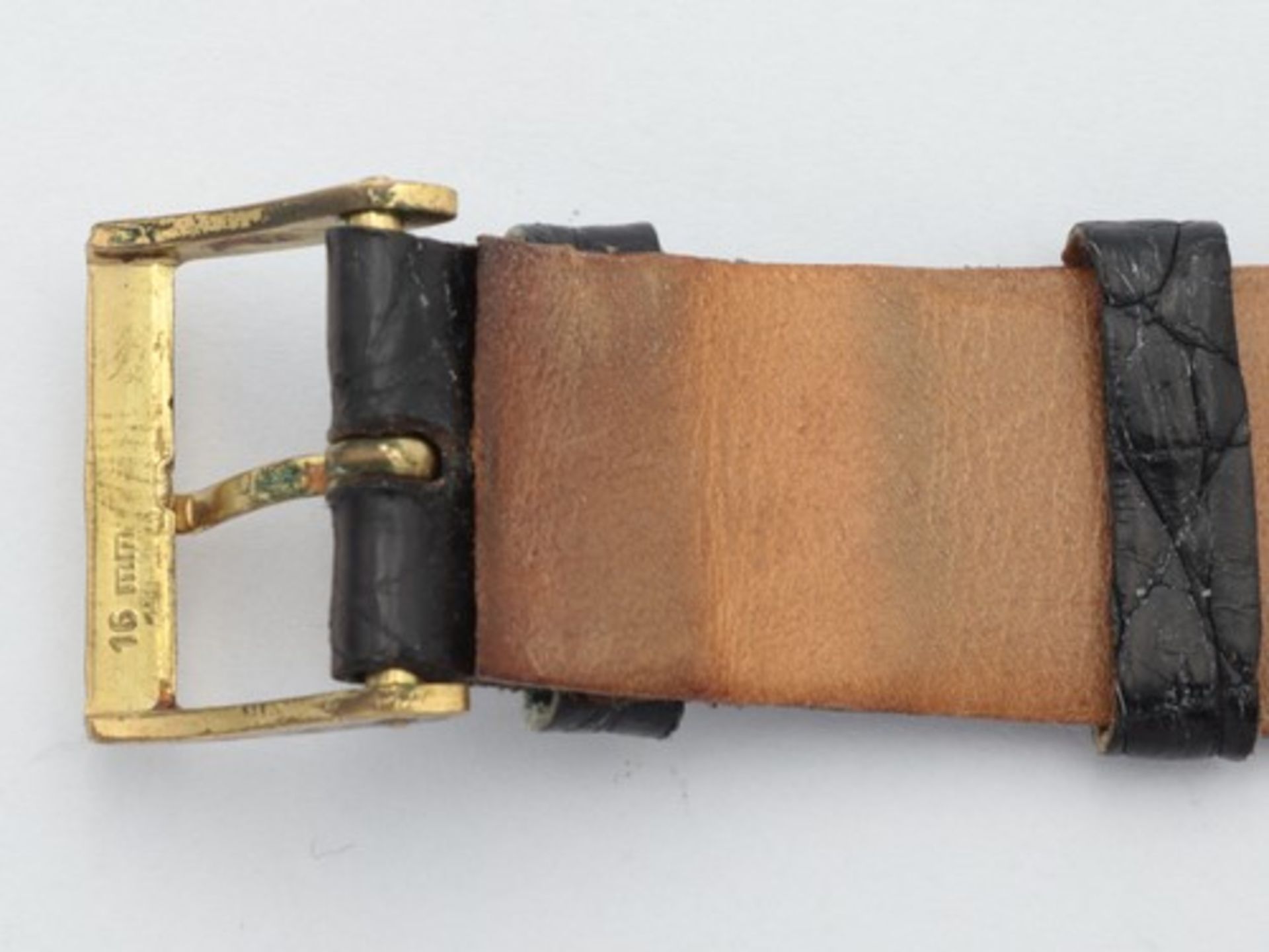 Onsa - HerrenarmbanduhrSchweiz, GG 750, rundes Gehäuse, Dca.3,2cm, goldfarbenes Zifferblatt, gem. " - Bild 4 aus 4