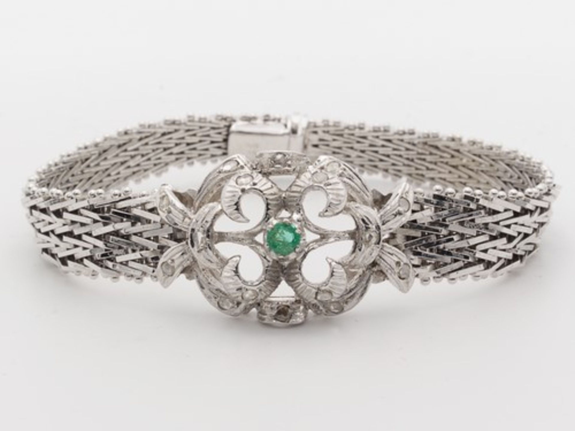 Diamant/Smaragd - ArmbandWG 750, florales, durchbrochenes Mittelteil, besetzt mit Diamantrosen u.