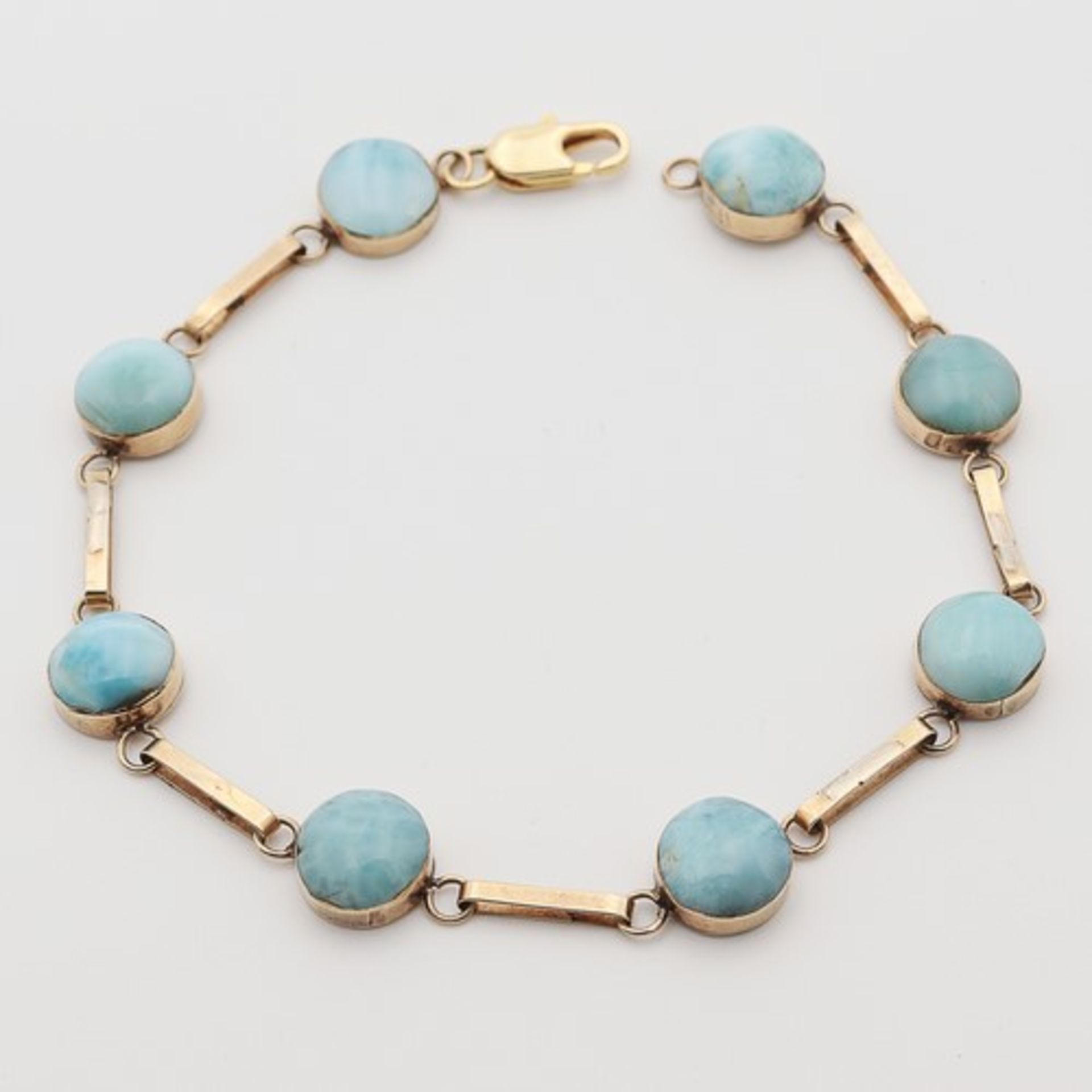 Armband14K gem., runde Fassungen wohl besetzt mit Larimar-Cabochons, tlw. besch., an beweglichen