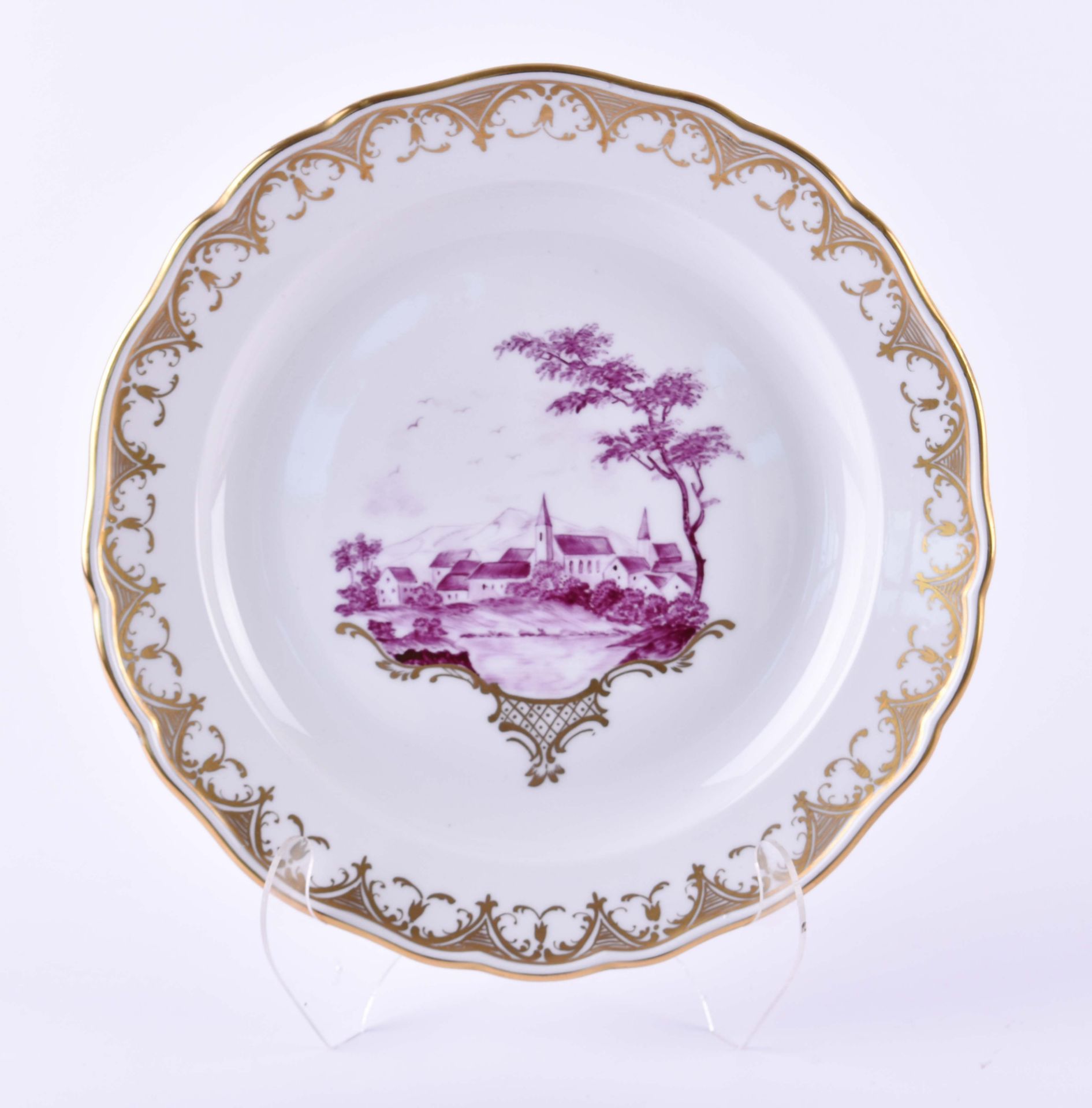 Plate Meissen 19th centurywith a purple village view and rich gold ornamentation, blue sword mark