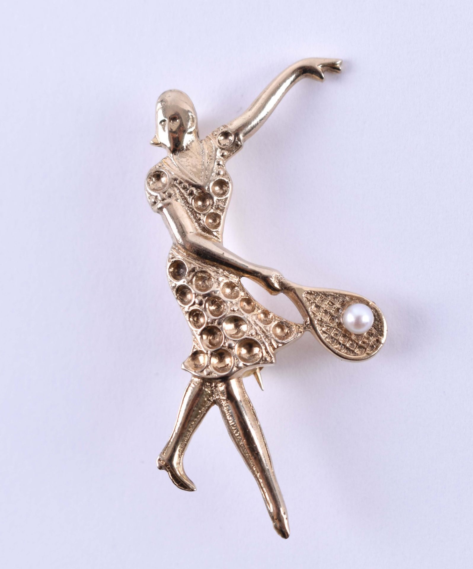 Womens brooch750 yellow gold, checked, beautiful brooch in the form of a tennis player in the