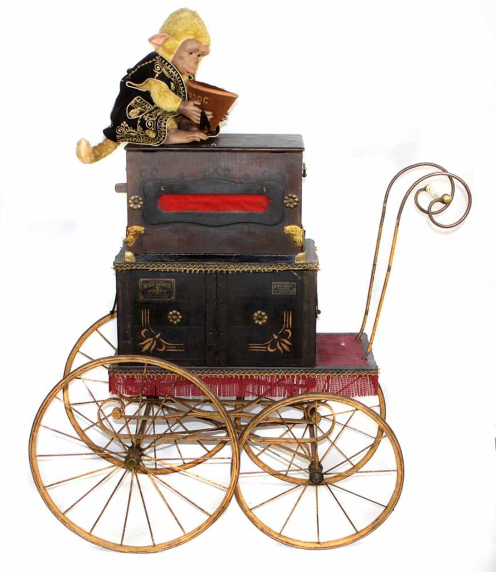 Leierkasten um 1890Drehorgel, mechanisches Musikinstrument als mehrteilige Ausführung auf Wagen