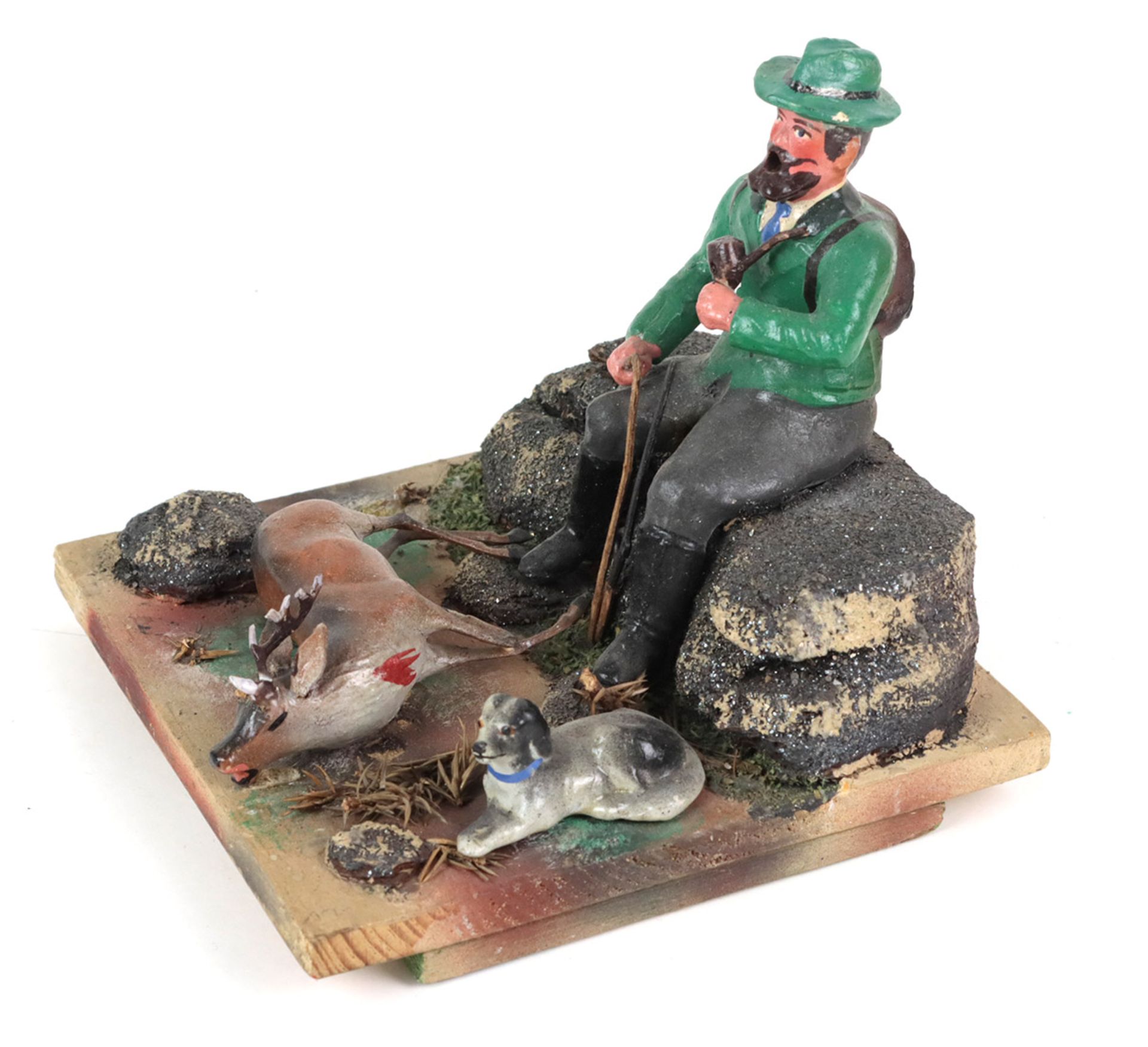 Räuchermann als JägerMasse farbig gefasst, auf Fels sitzender Jäger, mit Jagdhund u. erlegtem Hirsch - Bild 2 aus 2